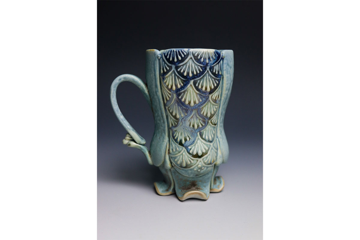 Teal floral foot mug by local ceramicist Ashtonn Means