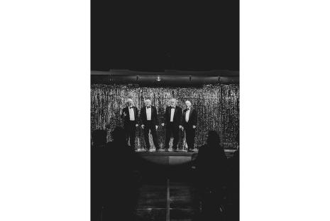 Canyon Grand singers on stage in black and white photo